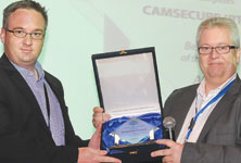 Francois Malan accepts the award for Milestone Partner of The Year 2011